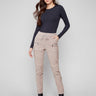 Almond corduroy jogger pants featuring a slim fit and zipper pockets, perfect for a chic yet casual look by Charlie B.