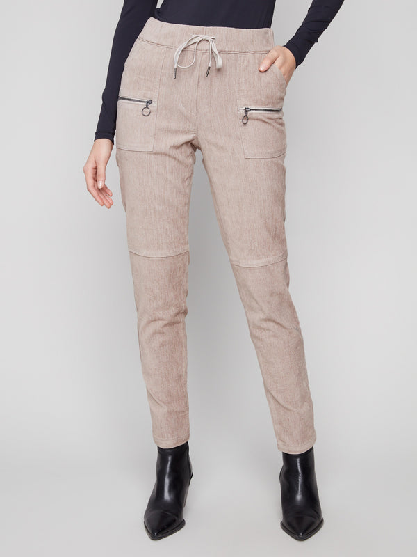 These almond jogger pants boast an elastic waistband with drawstrings and stretchy corduroy fabric for comfort by Charlie B.