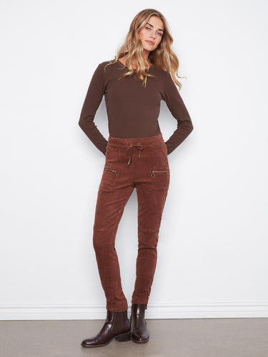 Slim fit corduroy pants in a rich hue, featuring a drawstring waistband for added comfort by Charlie B.