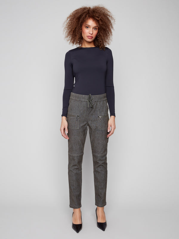 Elegant spruce corduroy pants with two back pockets adding functionality to fashion by Charlie B.