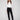 Black corduroy jogger pants featuring a slim fit and elastic waistband with drawstrings for comfort by Charlie B.
