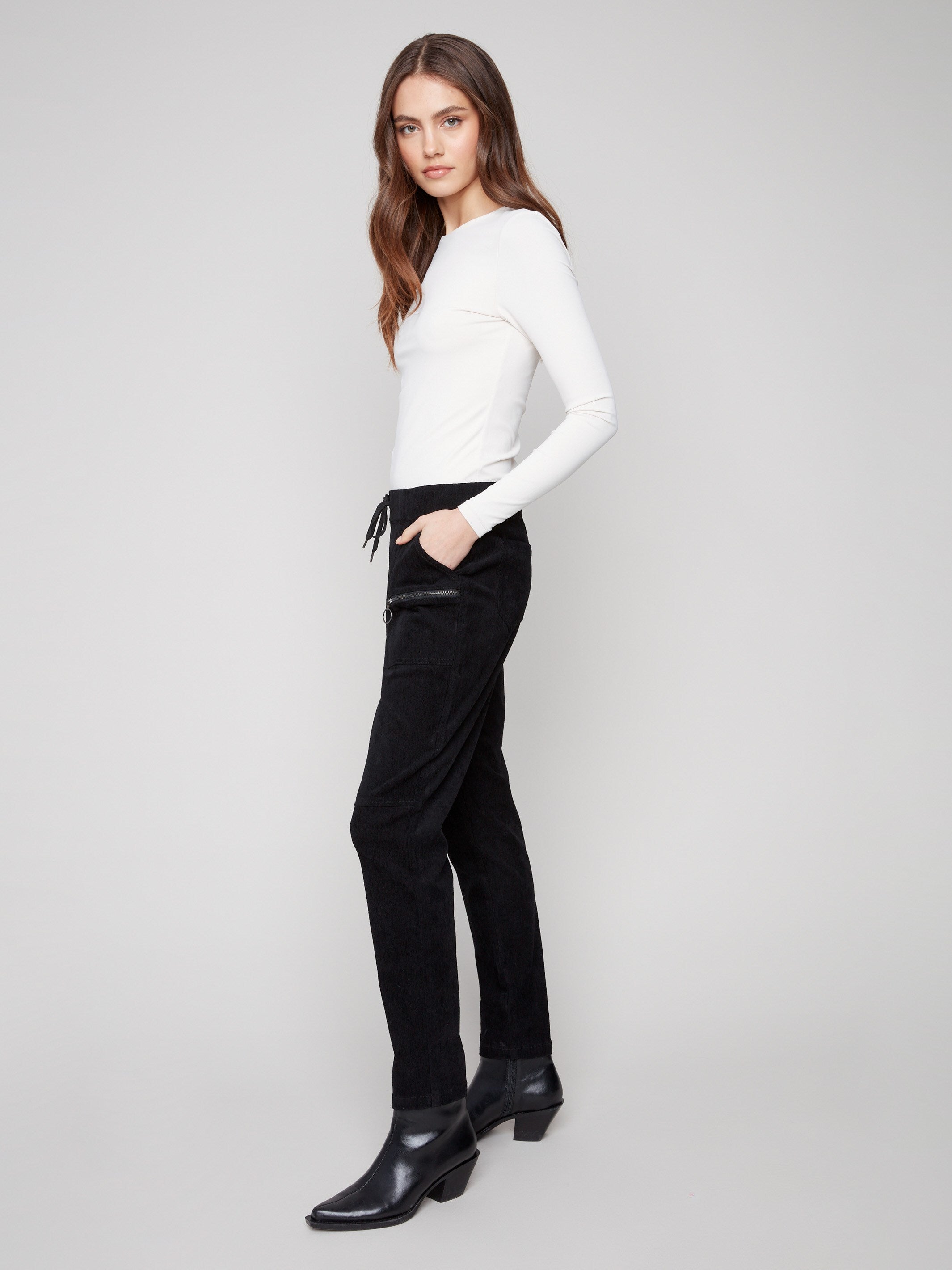 Mid-rise waist black joggers crafted from soft corduroy, complete with two front pockets and drawstring by Charlie B.