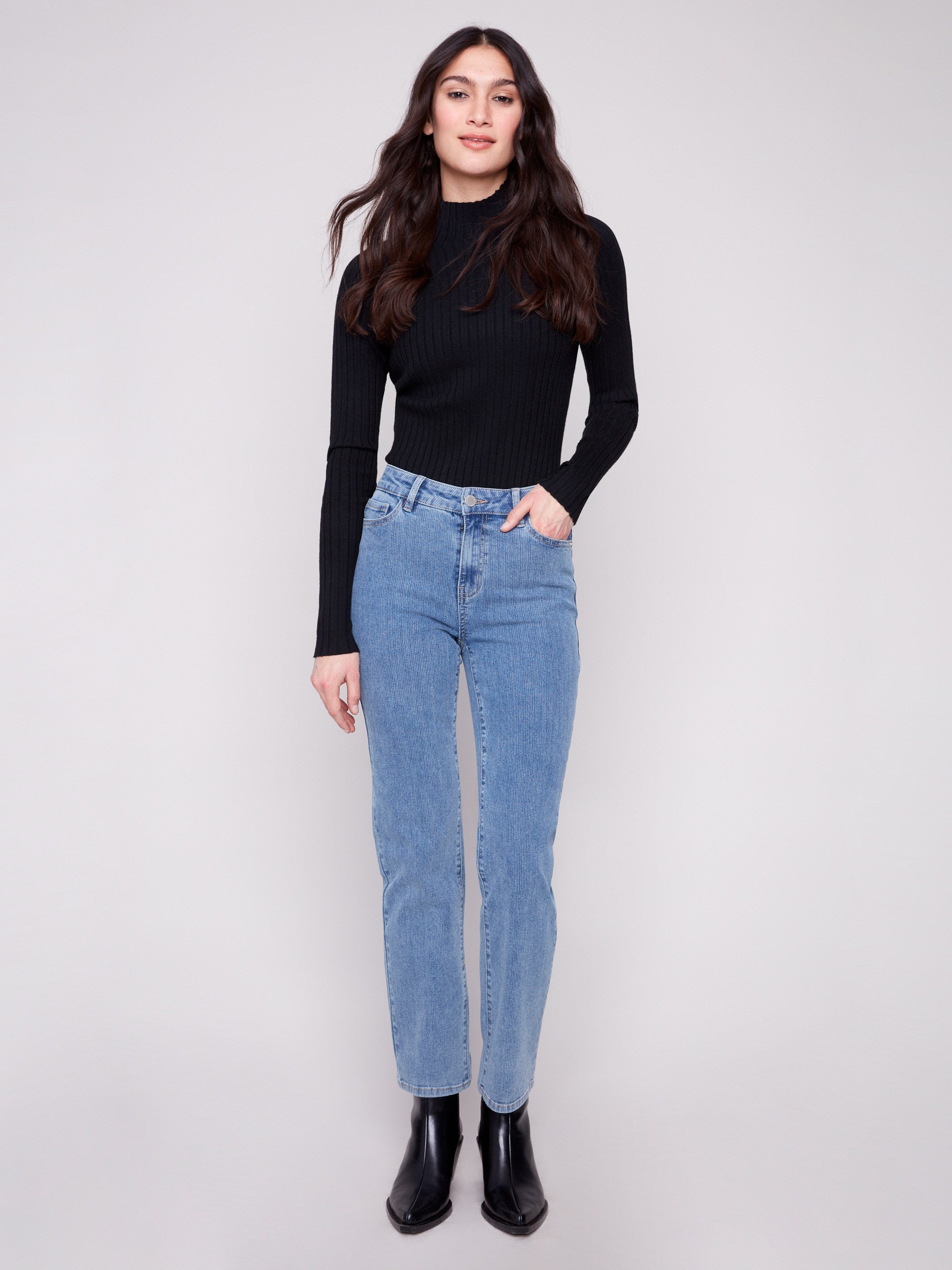 Blue denim corduroy pants featuring a long length and five-pocket design, perfect for versatile styling by Charlie B.