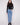 Blue denim corduroy pants featuring a long length and five-pocket design, perfect for versatile styling by Charlie B.