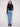 Blue denim corduroy pants featuring a long length and five-pocket design, perfect for versatile styling by Charlie B.