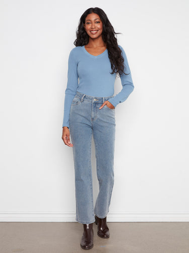 These jeans feature a straight leg design, offering a timeless style perfect for any occasion. By Charlie B.