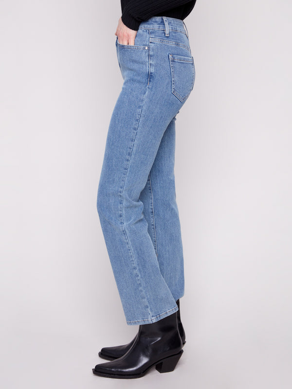 These straight-leg jeans in blue corduroy feature a stylish five-pocket design for added functionality by Charlie B.
