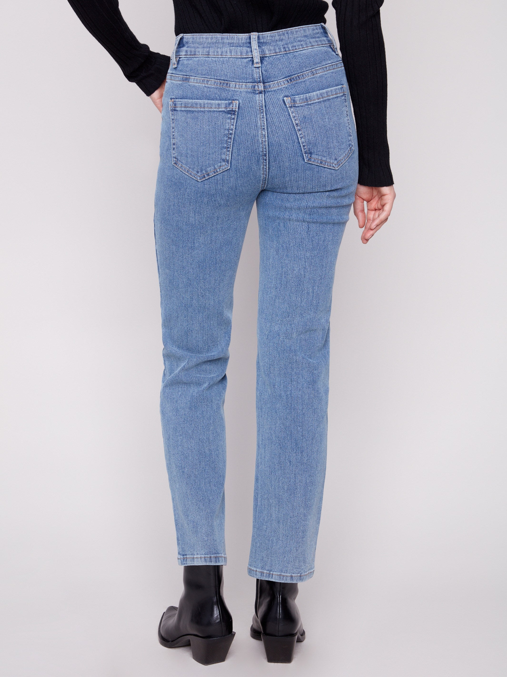 Enjoy the regular rise fit of these blue denim pants with their classic straight-leg cut by Charlie B.