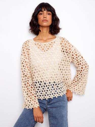Crafted from a soft cotton blend, this top ensures comfort and style in every wear. A must-have addition to your closet by Charlie B.