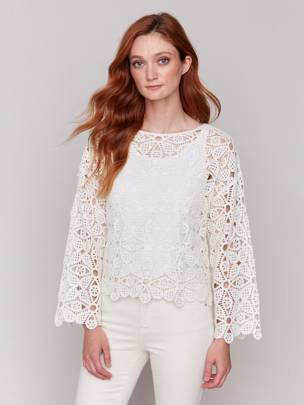 Trendy 3/4 sleeve crocheted piece in nature-inspired colorway by Charlie B.