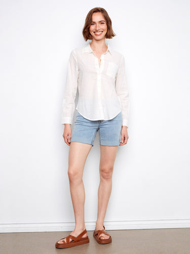 Crafted from soft 100% cotton, this white shirt includes practical roll-up sleeves and a chest pocket by Charlie B.