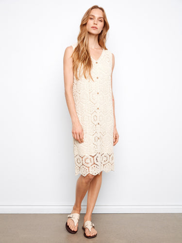 Elegant crochet midi dress featuring a decorative button detail, perfect for casual outings. Crafted with care by Charlie B.