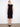 A timeless knee-length silhouette in this black crochet dress ensures a flattering fit for various occasions. By Charlie B.