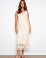 This dress features a V-neckline and showcases a classic, elegant style perfect for any occasion. By Charlie B.