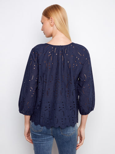 Stylish navy blouse with elastic cuffs and intricate design, offering both comfort and elegance by Charlie B.