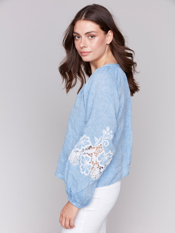 Blouse showcasing artisan embroidery on the sleeves by Charlie B.