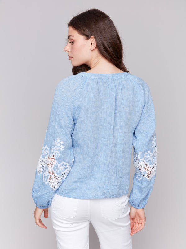 Sophisticated button-front closure on a chambray blouse by Charlie B.