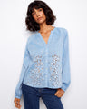 Chic shirt featuring eyelet embroidery and a button-front closure, perfect for casual outings by Charlie B.