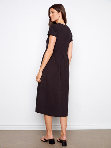 Sophisticated black cotton dress with timeless short sleeves and elegant design by Charlie B.