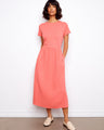 A coral midi dress featuring a classic crew neckline and short sleeves, crafted from 100% cotton for everyday comfort by Charlie B.
