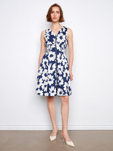 Elegant floral dress with a flattering V-neck design, perfect for any occasion. The dress exudes charm and sophistication by Charlie B.