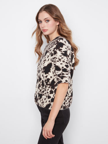 Fashionable top crafted from soft brushed knit, offering both style and comfort in an eye-catching design by Charlie B.