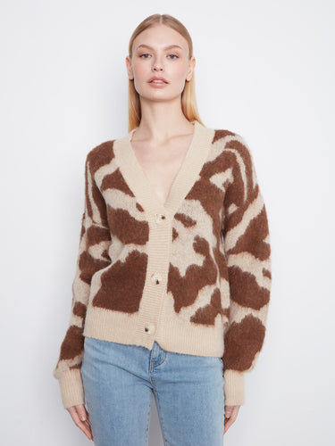 Cozy cardigan with a V-neck and fuzzy knit texture, perfect for layering. By Charlie B.