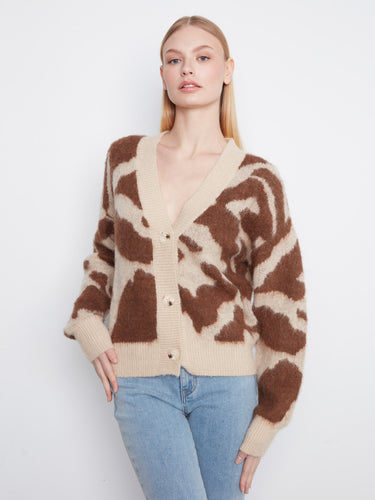 Drop shoulder design adds a modern touch to this versatile knit cardigan. By Charlie B.