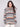 Autumn-colored sweater with a cozy cowl neck and stylish round hem, perfect for chilly days by Charlie B.