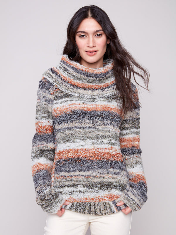 Autumn-colored sweater with a cozy cowl neck and stylish round hem, perfect for chilly days by Charlie B.