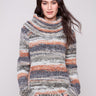 Autumn-colored sweater with a cozy cowl neck and stylish round hem, perfect for chilly days by Charlie B.