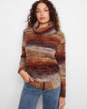 Cowl neck sweater in a rich raisin hue with drop shoulders and ribbed cuffs, offering a cozy and stylish look by Charlie B.