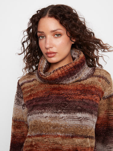 Striped cable knit sweater featuring a cowl neckline and rounded hem, perfect for layering in cool weather by Charlie B.