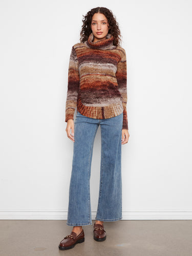 Cable knit sweater with drop shoulders and bold stripe pattern, ideal for casual outings or cozy nights in by Charlie B.