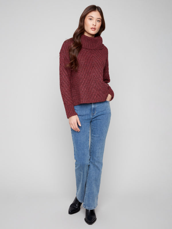 Elegant cabernet sweater featuring a relaxed fit and diagonal cable knit pattern for casual comfort by Charlie B.