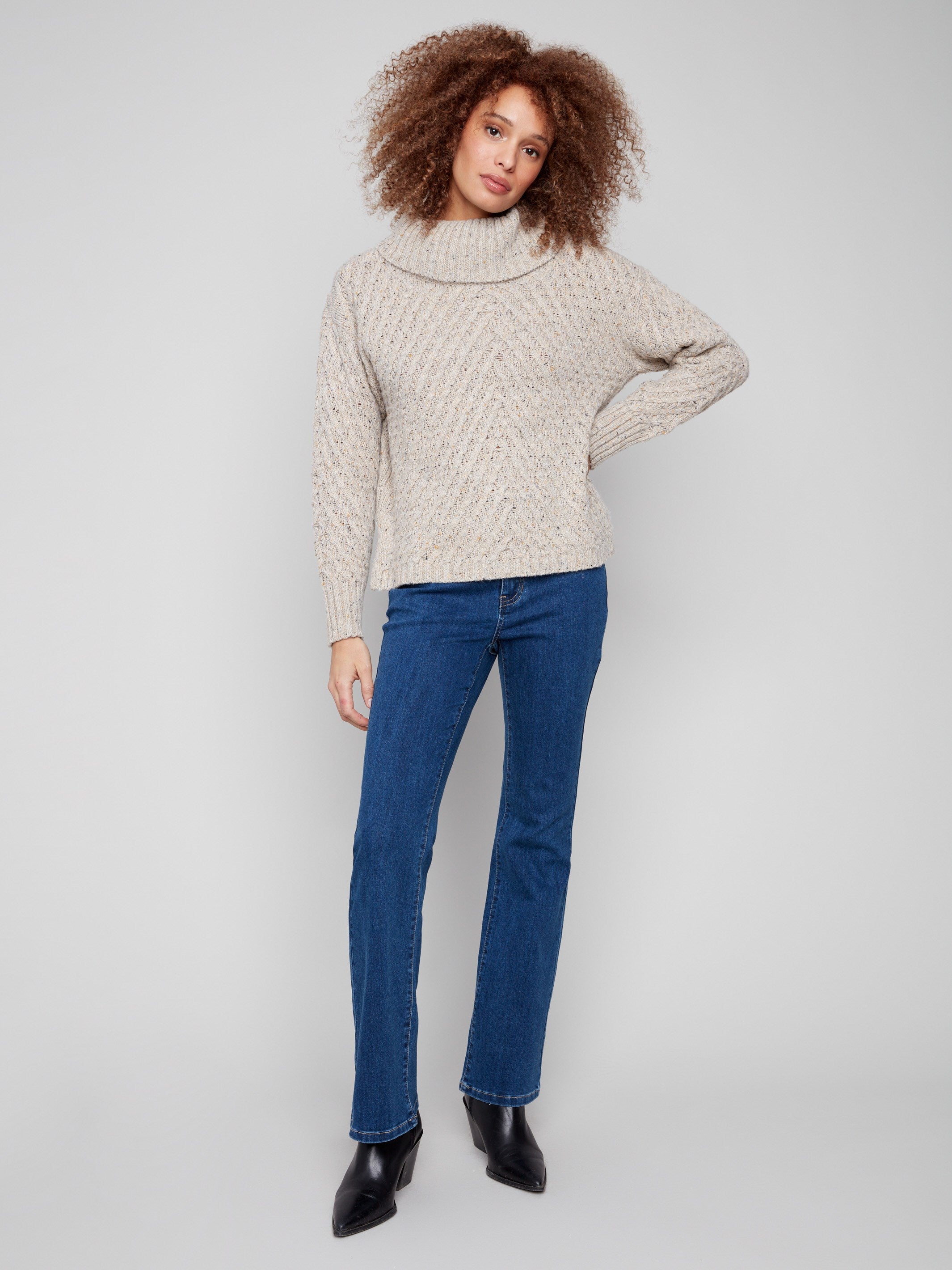 Stylish relaxed fit sweater in Heather Oat with a charming cable knit texture by Charlie B.