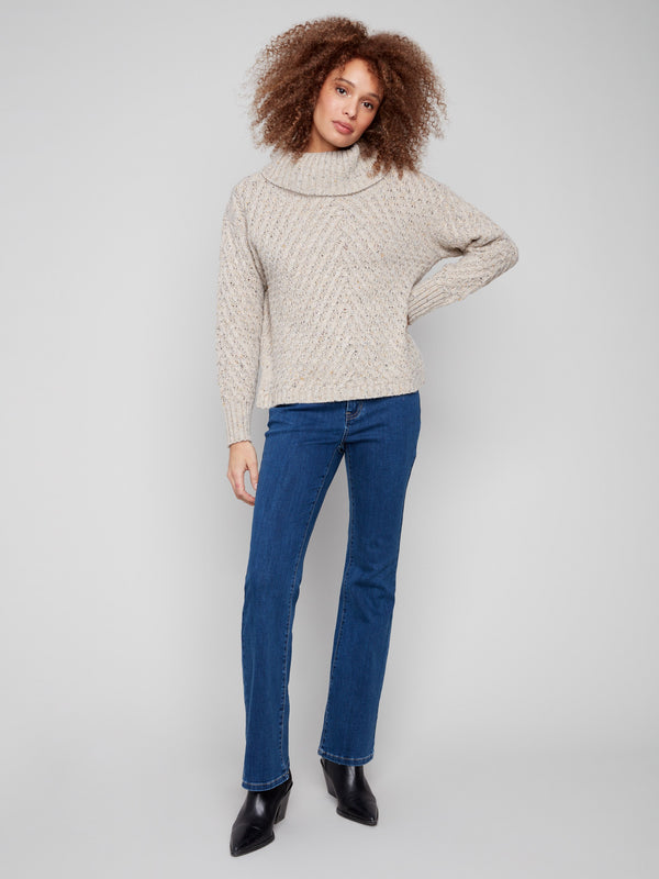 Stylish relaxed fit sweater in Heather Oat with a charming cable knit texture by Charlie B.