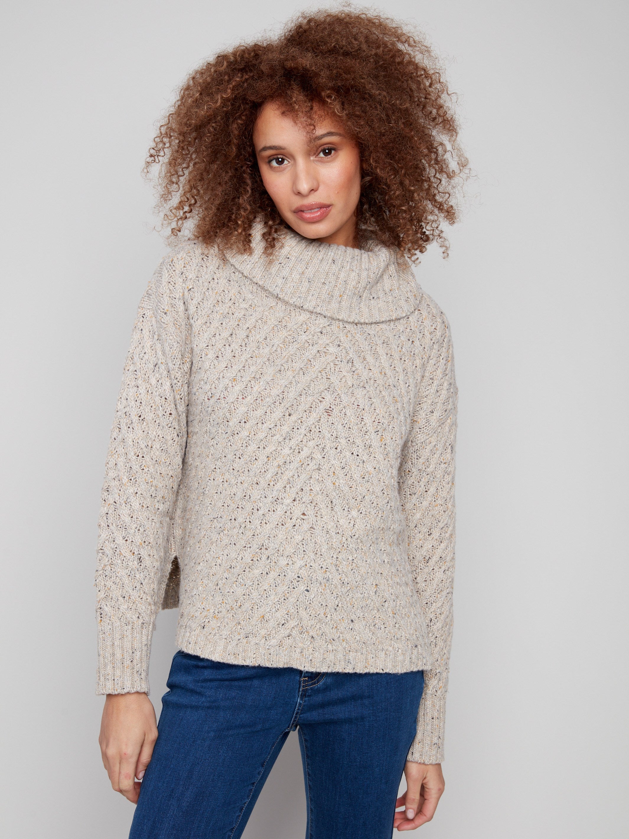 Elegant Heather Oat sweater with ribbed cuffs and a comfortable slit hem for added style by Charlie B.