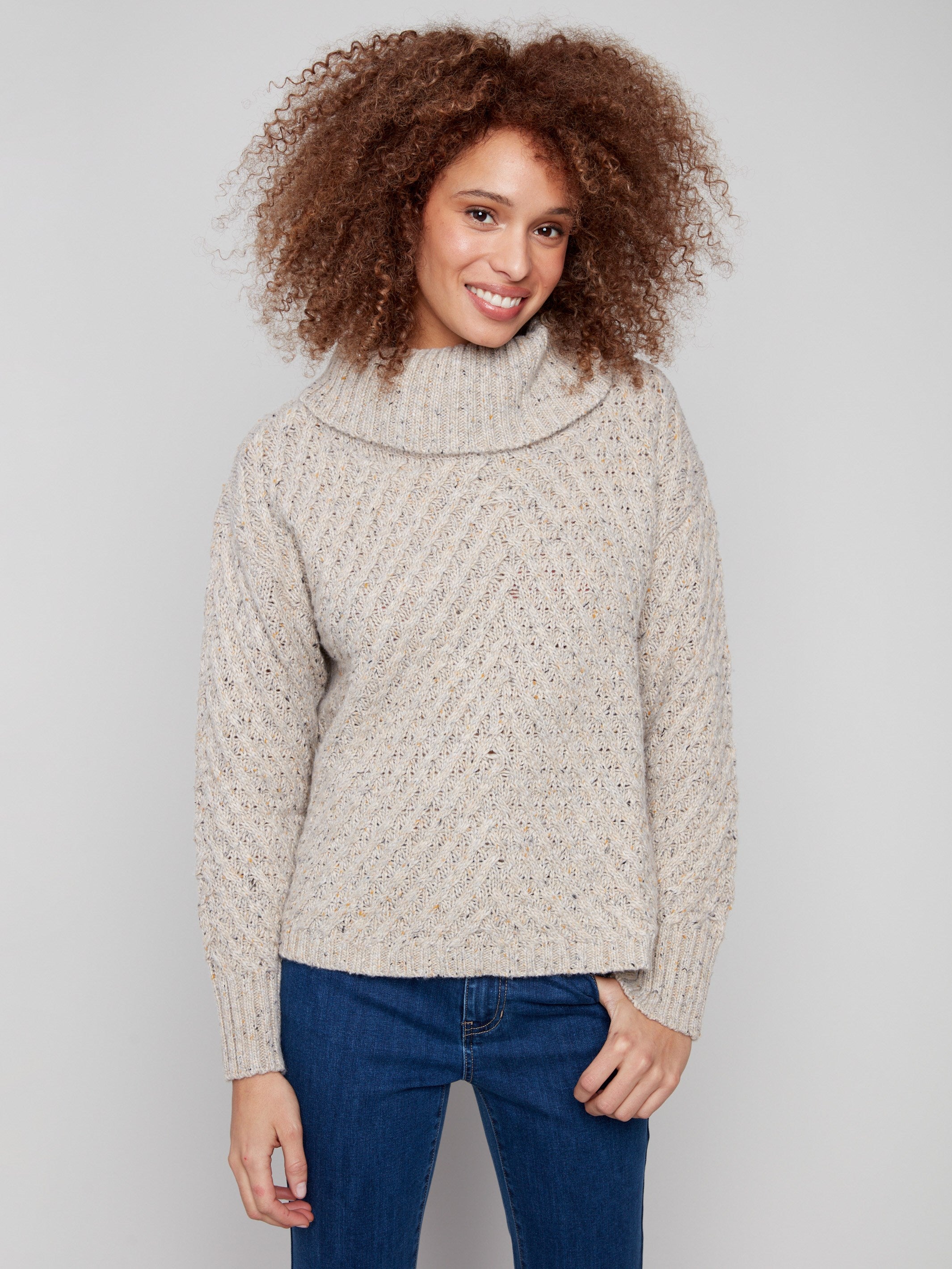 Chic diagonal cable knit pattern in a relaxed fit, ideal for casual outings by Charlie B.