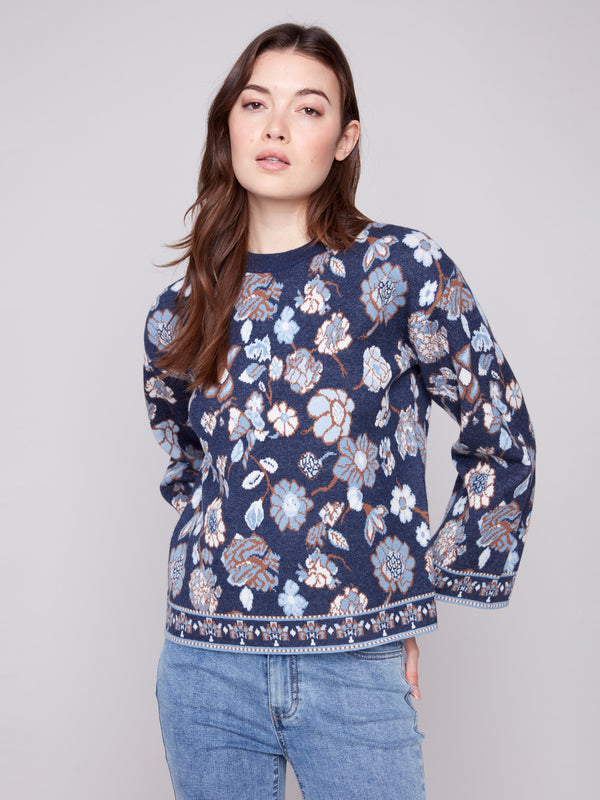 Chic crew neck navy sweater adorned with an eye-catching floral jacquard design by Charlie B.
