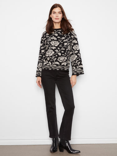The drop shoulder style enhances the comfort and modern appeal of this beautifully patterned sweater. By Charlie B.