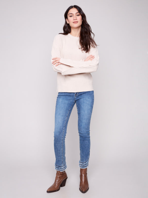 Chic heather oat sweater with cable sleeve accents by Charlie B.