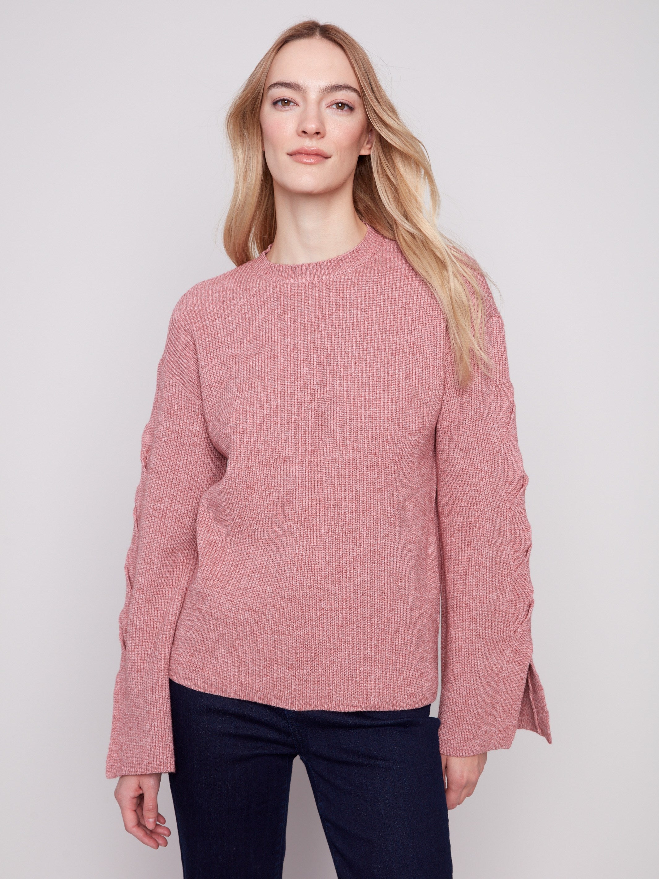 Primrose sweater featuring a classic crew neck and elegant drop shoulders by Charlie B.