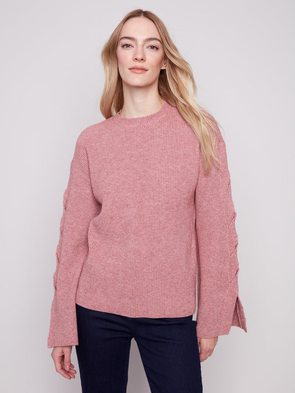 Primrose sweater featuring a classic crew neck and elegant drop shoulders by Charlie B.