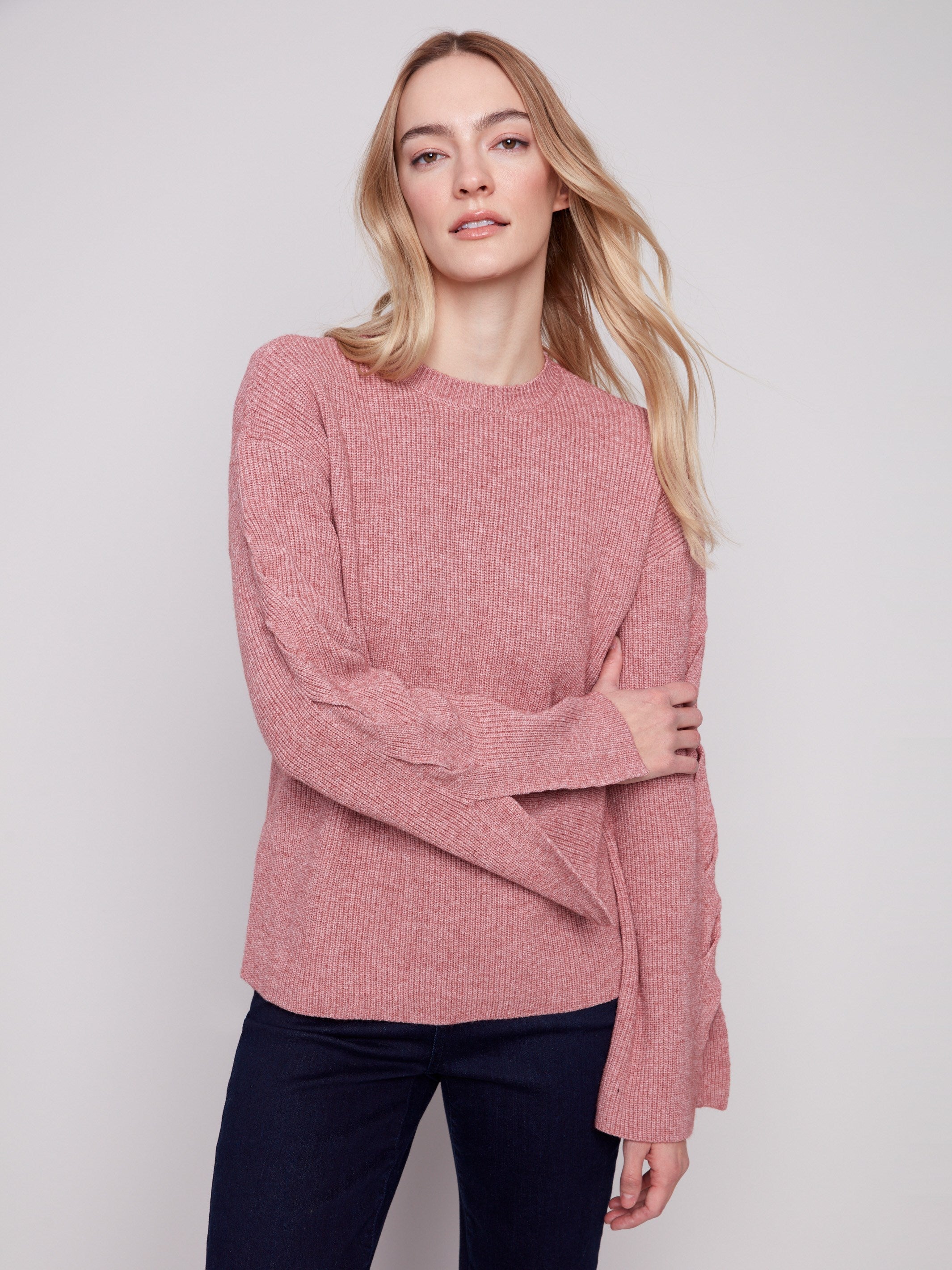 Stylish primrose sweater with intricate cable detail on the sleeves by Charlie B.