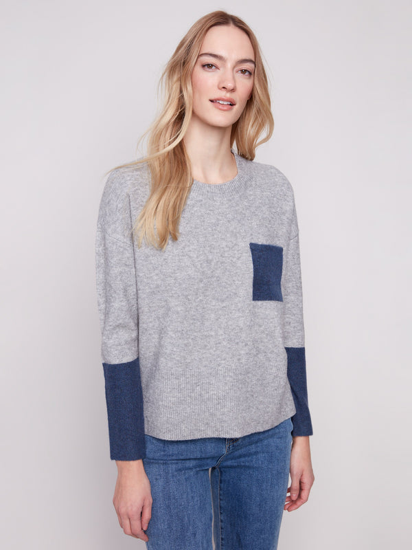 Heather grey sweater featuring a crew neck design with navy contrast details on the chest pocket by Charlie B.
