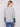 The contrast ribbed sleeve cuffs bring a stylish touch to this heather grey sweater with navy accents by Charlie B.