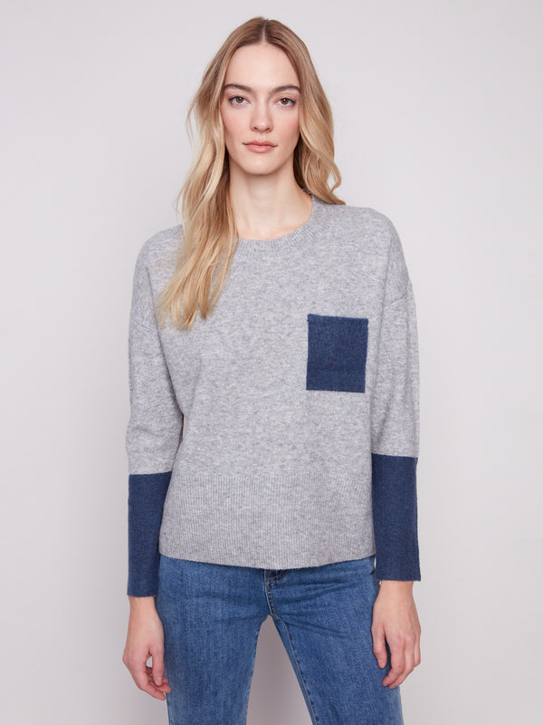 Stylish contrast chest pocket and ribbed sleeve cuffs on this heather grey crew neck sweater by Charlie B.