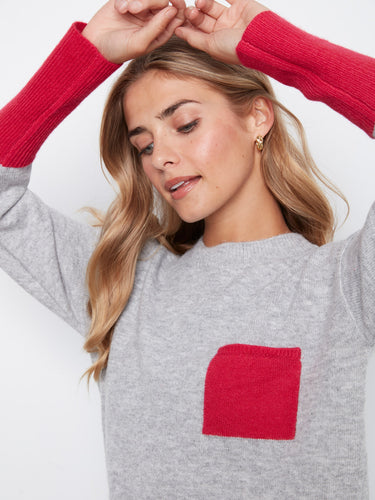 The crew neckline adds a classic touch to this stylish sweater, perfect for any occasion. By Charlie B.