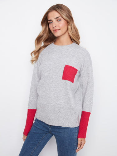 The soft fabric of this sweater provides ultimate comfort while maintaining a chic look. By Charlie B.